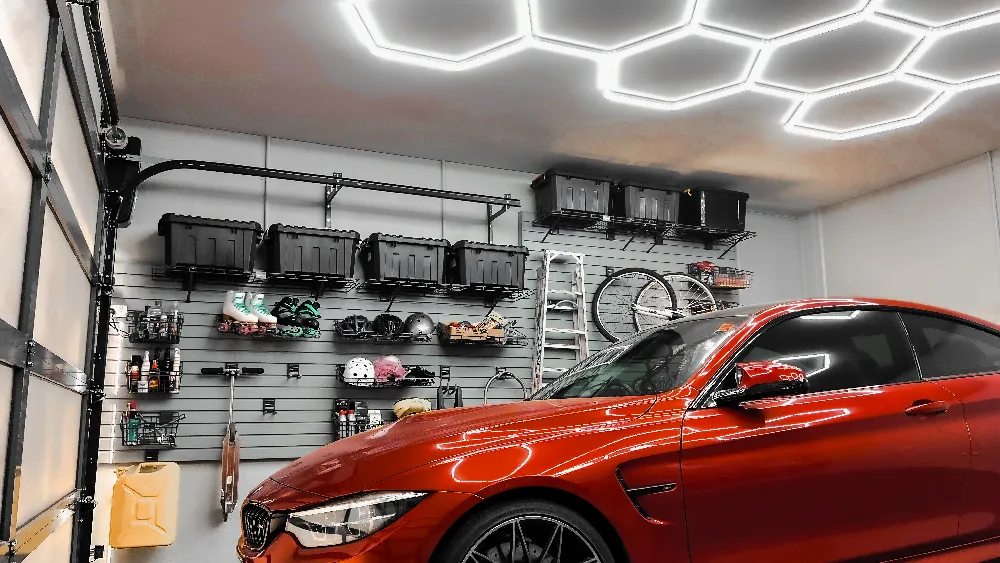 Organised garage with the car parked inside